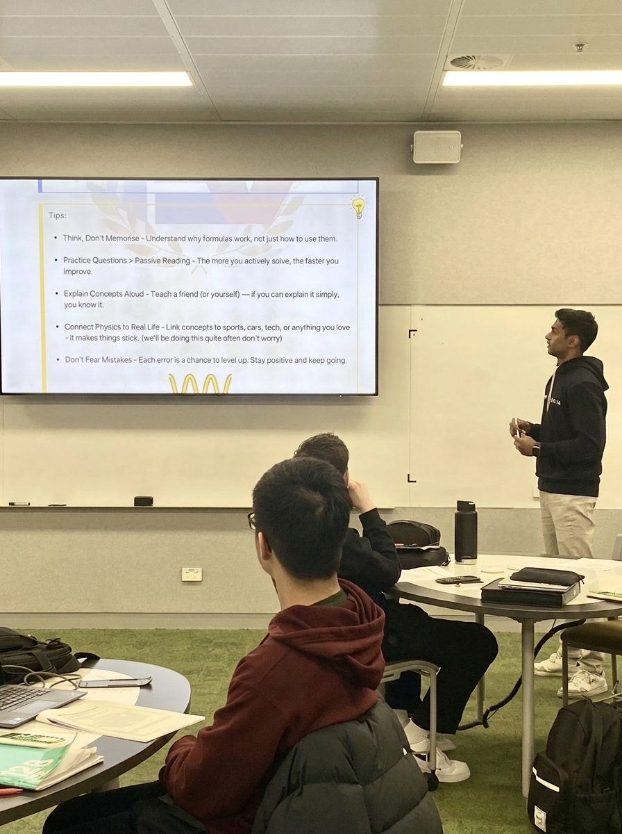 Tutor teaching VCE Physics study tips during workshop