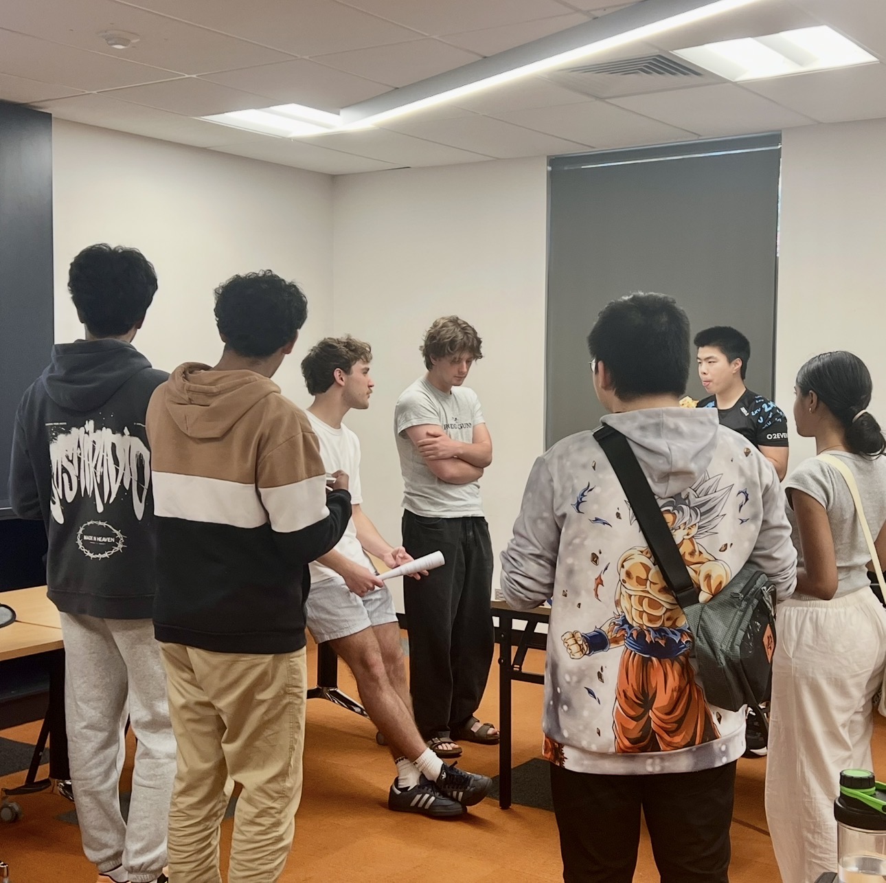 Students discussing strategy after a mock exam